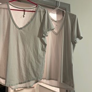 Two white lululemon love v necks